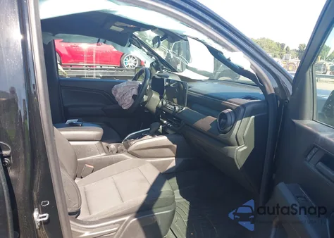 2023 Chevrolet Colorado 4Wd Short Box Trail Boss from USA, damaged, VIN 1GCPTEEK2P1256285